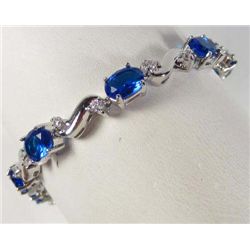 9559 - WHITE GOLD PLATED SAPPHIRE TENNIS BRACELET