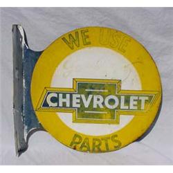 Lot 117: Metal  We Use Genuine Chevrolet Parts  Advertising Sign