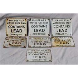 Lot 130:  Seven (7) Tin  Contains Lead  Gas Pump Signs