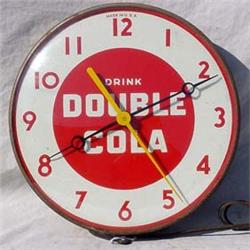 Lot 135: Tin Round  Drink Double Cola  Hanging Clock