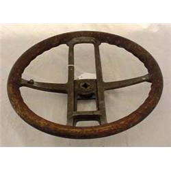 Lot 233: Cast Aluminum Steering Wheel