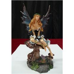 Winged Faerie Or Fairy On Toadstool