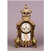 Image 1 : A French Gilt Brass and Porcelain Mounted Mantel Clock], of architectural form, with scroll enric...