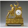 Image 1 : A Charles X Ormolu Mantel Clock, by Hesnil, Paris], of Empire style, with signed enamel dial, in...