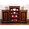 Image 1 : A Victorian Ebonised and Amboyna Credenza], the raised centre section set with red plush lined sh...