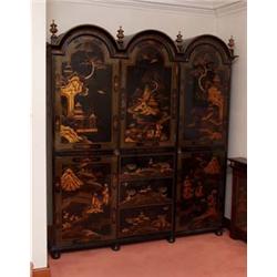 A Chinoiserie Bedroom Suite], comprising triple arched wardrobe centred by a cupboard enclosing s...