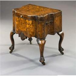 An 18th Century Dutch Walnut and Marquetry Night Commode], with a rising lid (interior lacking) o...