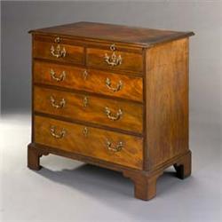 A George III Mahogany Chest], with a moulded top and slide over two short and three long drawers,...