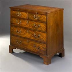 A George III Mahogany Chest], with a moulded top and slide over two short and three long drawers,...