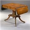 Image 1 : A Regency Rosewood and Gilt Metal Mounted Sofa Table], having a crossbanded round-cornered top ov...