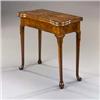 Image 1 : A George II Walnut Card Table], the baize-lined eared top with candle dishes and counter wells, o...