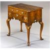 Image 1 : A George II Walnut and Featherbanded Lowboy], having a moulded edge to the top over a long frieze...
