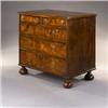Image 1 : An Early 18th Century Walnut Chest], the ovolo-moulded top inlaid with strung quadrants and arcs,...