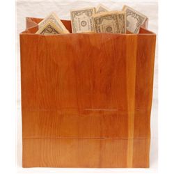 FIGURAL WOODEN SCULPTURE OF A BAG OF MONEY
