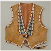 North Western Plains Indian beaded vest on  buckskin with trade cloth interior; very good  condition