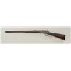 Winchester Model 1873 lever action rifle, .32  WCF cal., 24” octagon barrel, blue finish,  wood stoc
