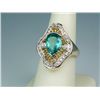 Image 1 : Fashionable 14 karat yellow gold ladies  custom made vintage design ring set with a  pear shape teal
