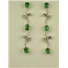 Image 1 : Sleek 14 karat white gold ladies drop design  earrings set with six fine green Emeralds  weighing ap