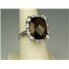 Trendy 10 karat white gold ladies handmade  ring set with a fine checkerboard cut smoky  topaz weigh