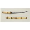 Image 1 : Display Japanese tanto sword in elaborately  carved bone scabbard with plain brass tsuba  and decora