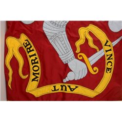 Nylon flag showing crest with armored arm and  dagger Latin motto  Vince . Est.:$100-$300.