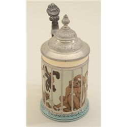 Mettlach stein with monkey scenes, approx. 7”  #106 on bottom; marked 4-1/10 liter, fine to  excelle