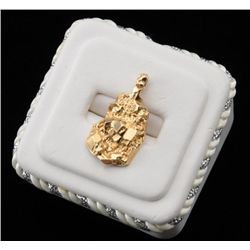 One 14k gold nugget pendant  weighing 4.5gms.  Est.: $250-$350.