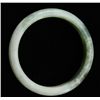 One jade light green jade bangle bracelet.  Est.: $150-$300