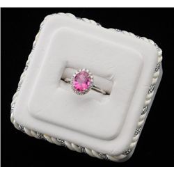 One ladies ring  in 14k white gold set with a  fine pink tourmaline weighing 2.40ct and  diamonds we