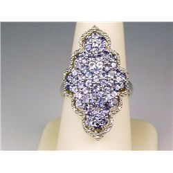 Spectacular ladies sterling silver ring set  with over 70 round Tanzanites weighing  approx. 4.00 ca