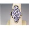 Spectacular ladies sterling silver ring set  with over 70 round Tanzanites weighing  approx. 4.00 ca