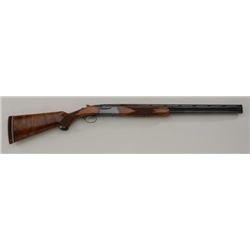 Ruger O/U shotgun, 20 gauge, 26” ventilated  rib barrels, blue finish, checkered wood  stocks, Pachm