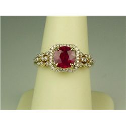 Elegant 14 karat yellow gold ladies ring set  with a round red ruby weighing approx.  1.50-2.00 cara