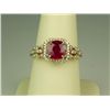 Image 1 : Elegant 14 karat yellow gold ladies ring set  with a round red ruby weighing approx.  1.50-2.00 cara