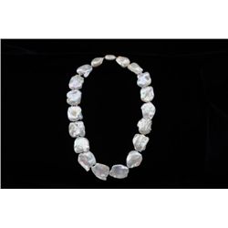 Baroque mobe pearl necklace from premier  jeweler located in the NorthWest; never worn;  retails for