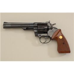 Colt Trooper MK III DA revolver, .22 Magnum  RF cal., 6” barrel, blue finish, checkered  wood medall