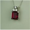 Image 2 : Gorgeous 14 karat white gold ladies pendant  set with an emerald cut created Ruby weighing  approx. 