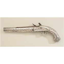 Flintlock Chieftain’s grade Horseman’s size  pistol with hand hammered sheet silver  overlay and hea