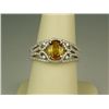 Image 1 : Intricate 14 karat white gold ladies custom  made ring by ‘VJ’ set with an intense yellow  Sapphire 