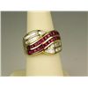 Image 2 : Stylish 18 karat yellow gold ladies custom  made ring channel set with 45 baguette cut  diamonds wei