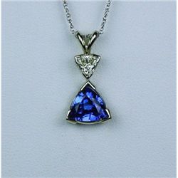 Elegant 14 karat white gold ladies handmade  necklace set with a AAA quality Tanzanite  weighing app