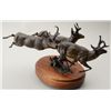 Image 1 : William Davis bronze #12/25 of 3 animals on  wood base, 9” in height x 23” includes base.   From the