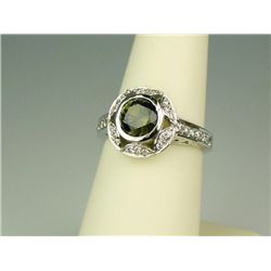 Elegant 14 karat white gold ladies vintage  design ring made by ‘LFJ’ bezel set with a  round green 