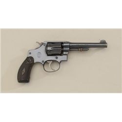 Smith & Wesson .32 Hand Ejector DA revolver,  .32 long cal., 4-1/4” barrel, blue finish,  checkered 