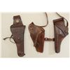Lot of three U.S. military leather holsters  including a flap holster with swivel for a  1911 pistol
