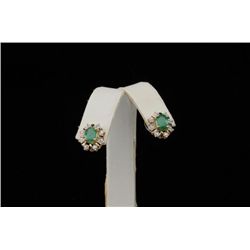 14K Yellow gold emerald and diamond earrings.   Est.:$700-$800.