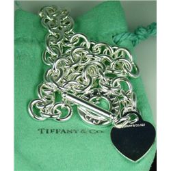 Exquisite Sterling Silver neckpiece made by  ‘TIFFANY” weighing over 74 grams in original  pouch. Go