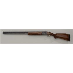 Browning Citori O/U shotgun, 12 gauge, 2-3/4”  chambers, 30” barrels, blue finish,  checkered wood s