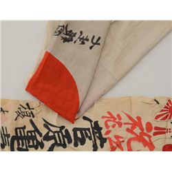 Two Japanese WW II flags; one standard “meat  ball” type with inscription, approx. 34” x  29”, silk 