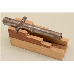 Handmade desk sized miniature metal cannon on  oak mount approx. 10” overall, unmarked with  touch h